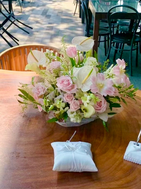 floral centrepiece with ring pillow