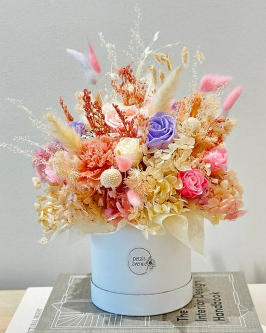 Sophisticated large flower box arrangement showcasing preserved roses and dried florals in a luxury presentation.