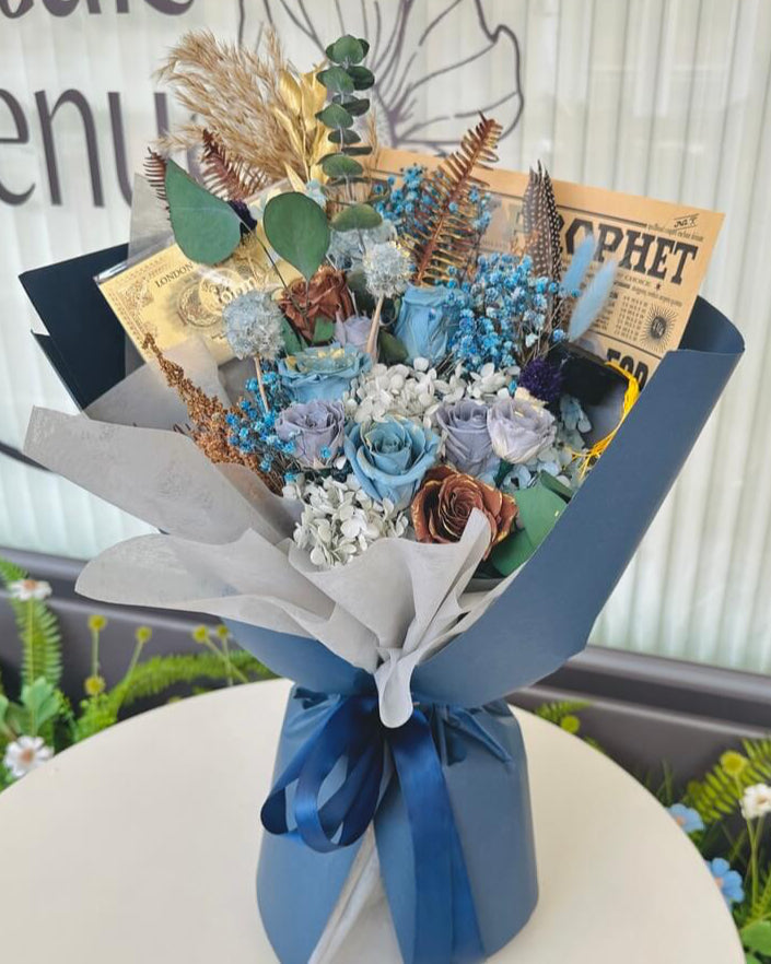 Blue and silver bouquet styled after Ravenclaw House, including exclusive Harry Potter-themed details.
