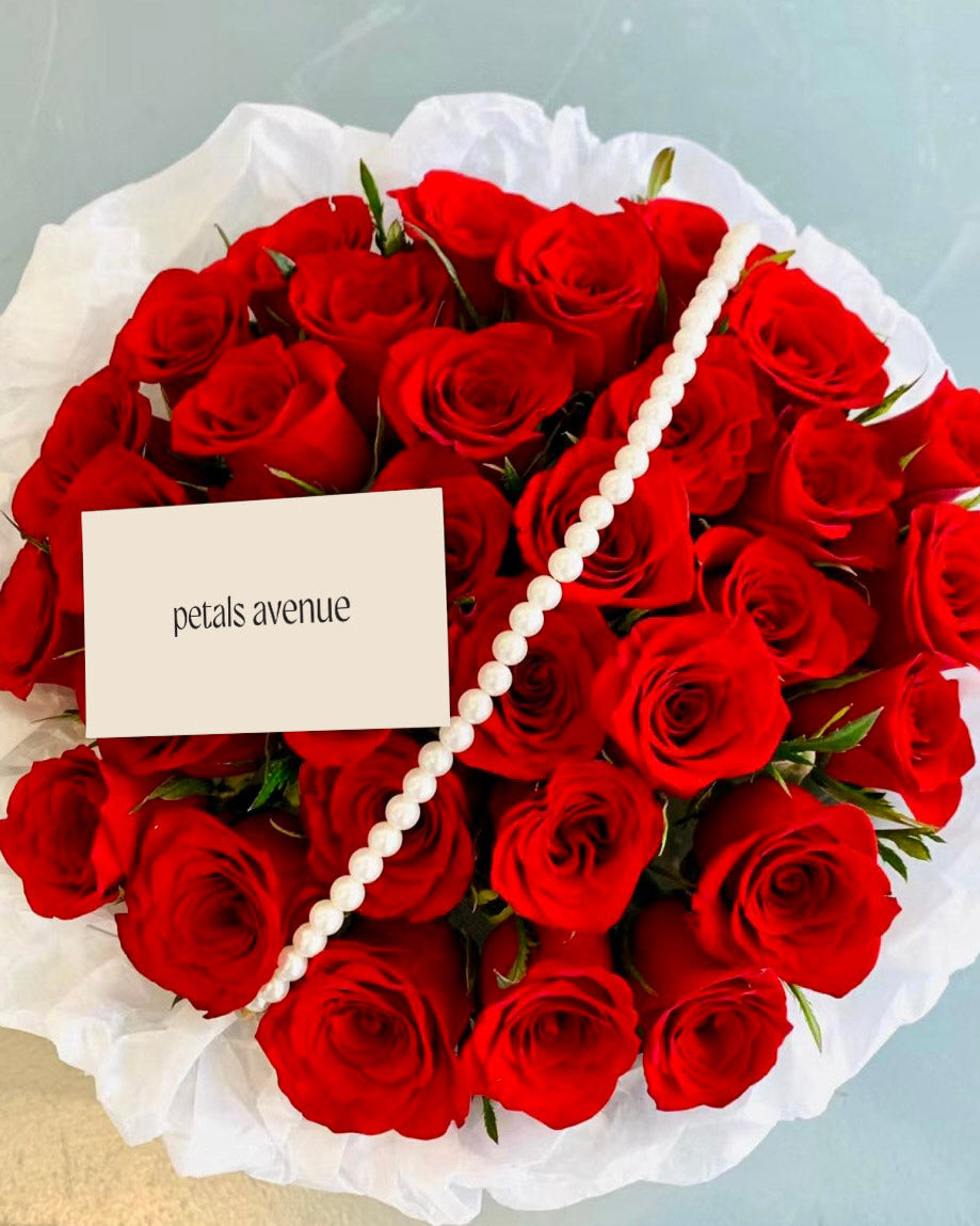 Vibrant 36-stalk rose bouquet symbolizing love, happiness, and positivity
