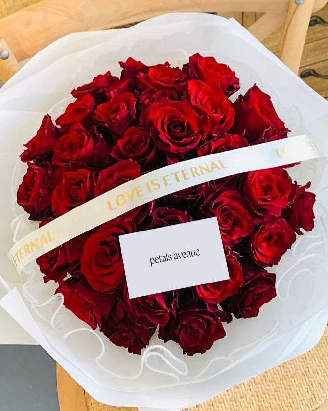Beautifully wrapped rose bouquet ready for gifting.