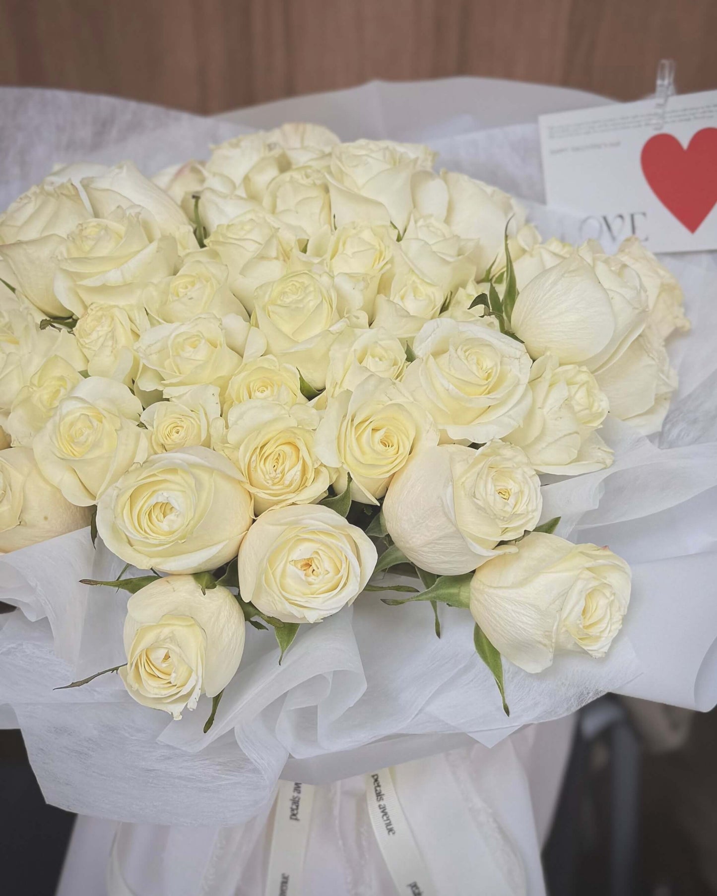 Luxurious white rose bouquet close up shot