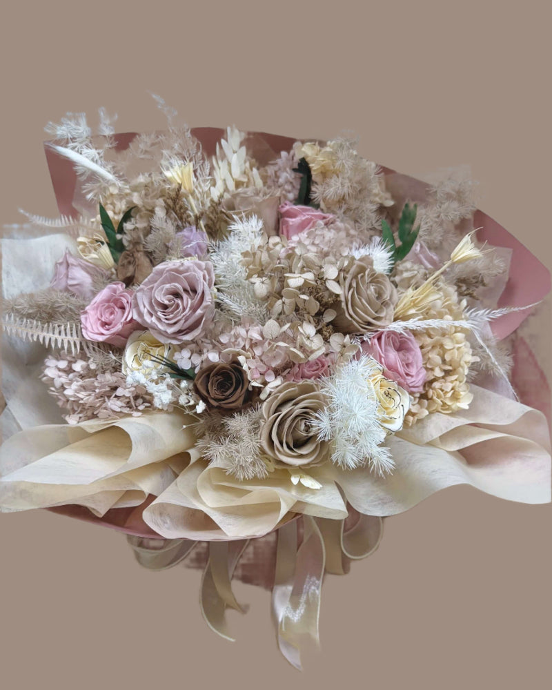 Handcrafted everlasting bouquet with soft pink, beige, and white preserved florals