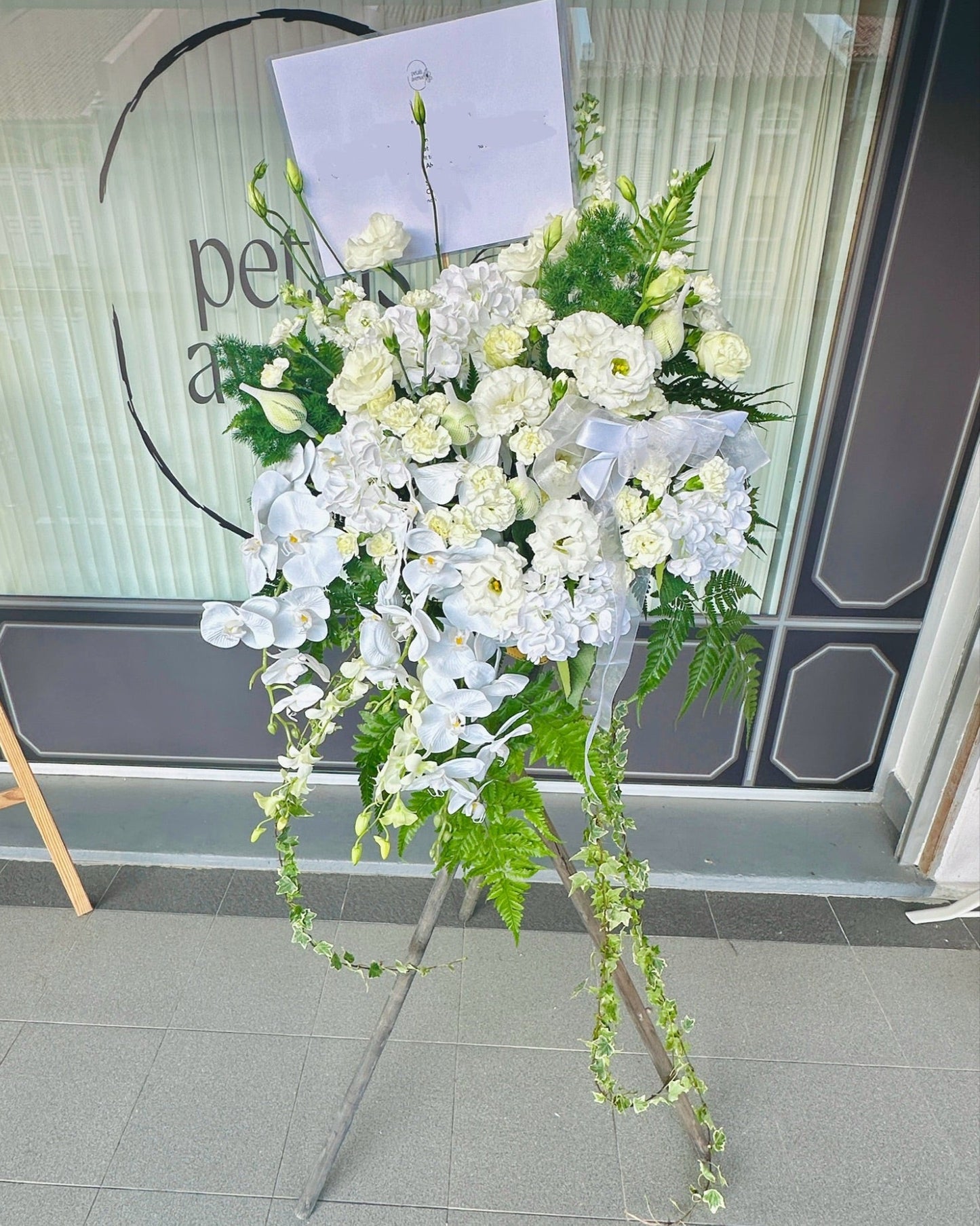 Peaceful Wishes White and Green Flower Wreath