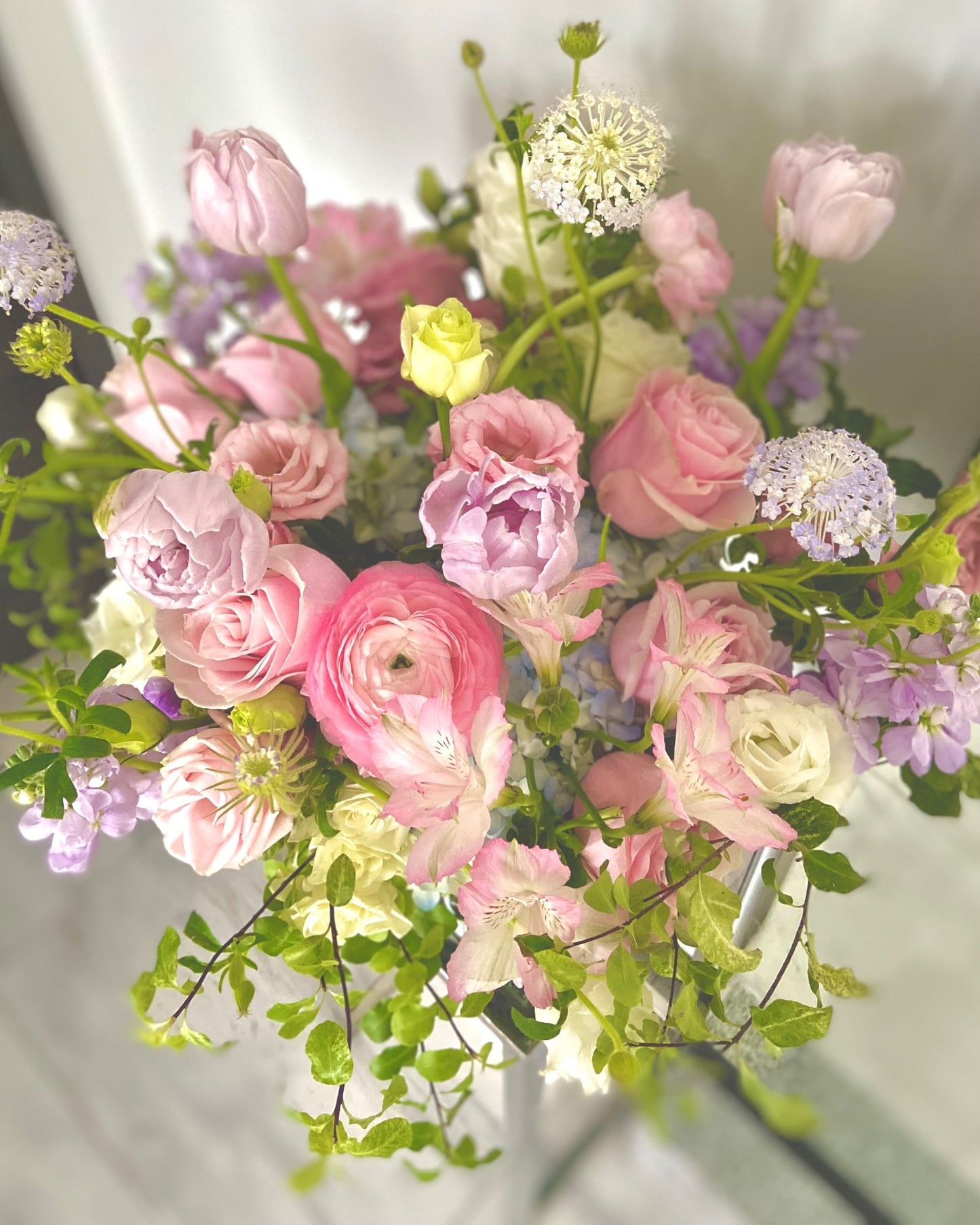 Luxurious Ritzy Petal Parcel with a curated selection of fresh seasonal blooms