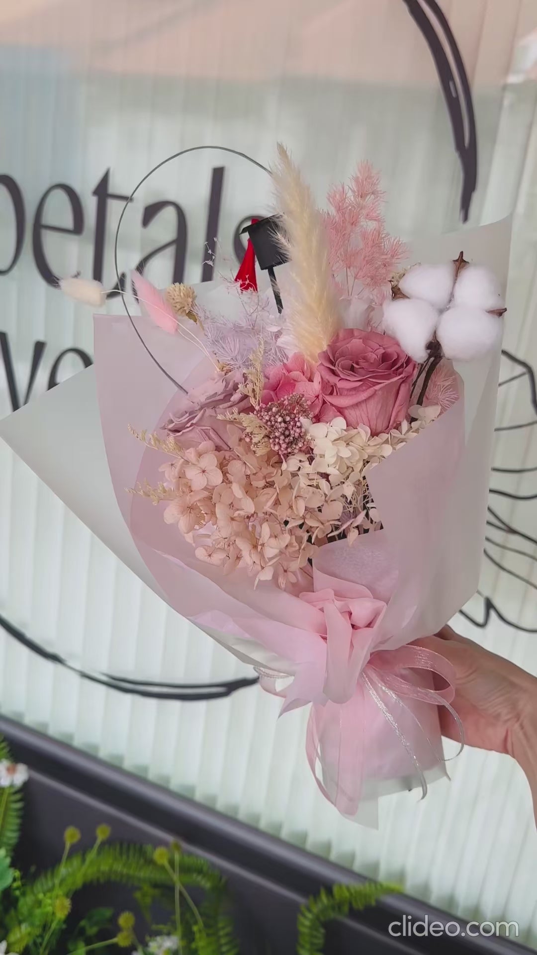 Detailed view of real preserved flowers in soft pink and champagne tones, showcasing their lasting beauty.