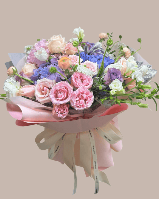 oversize hydrangea bouquet in asoft and light with ritzy fillers