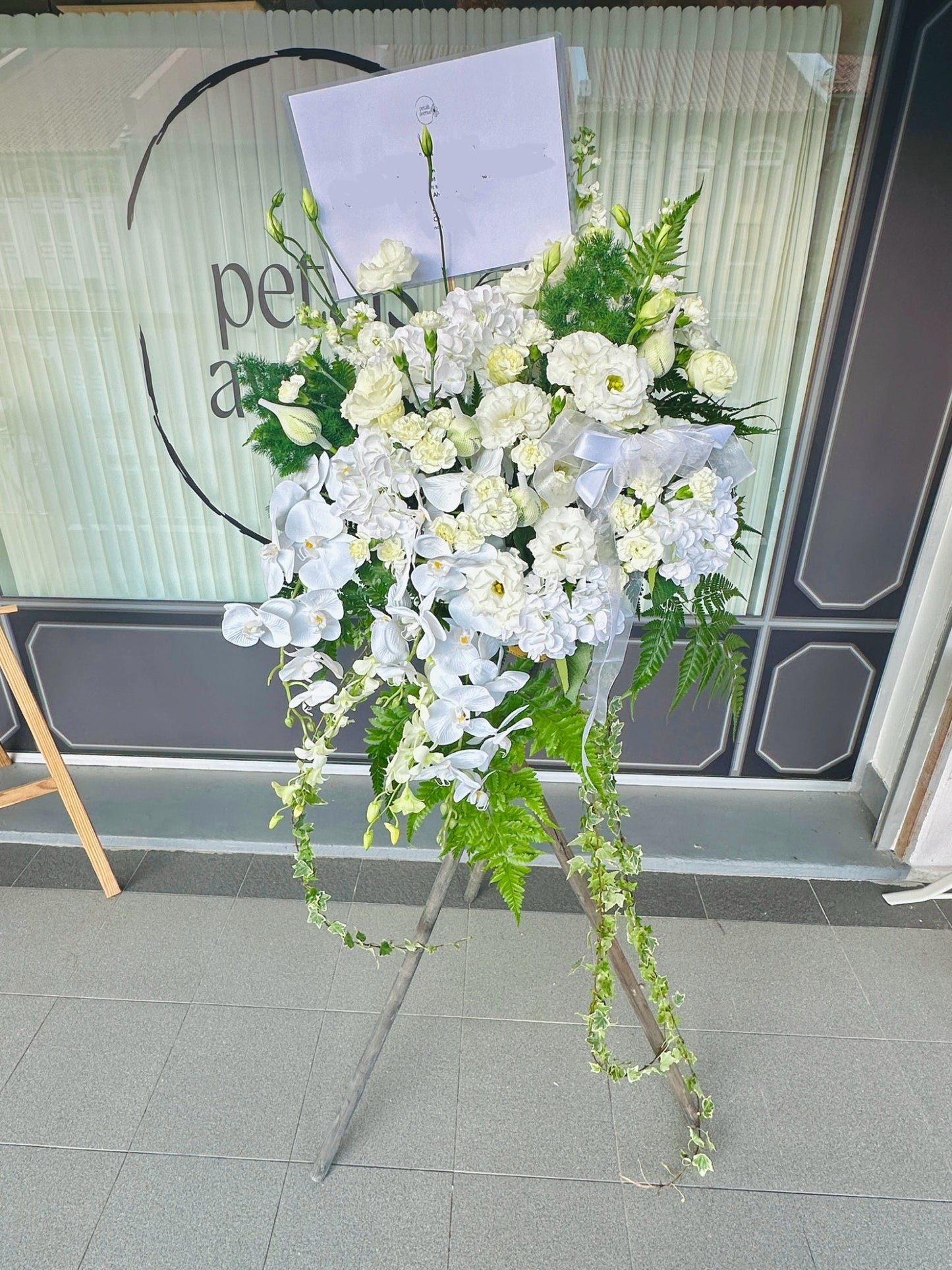 Peaceful Wishes White and Green Flower Wreath