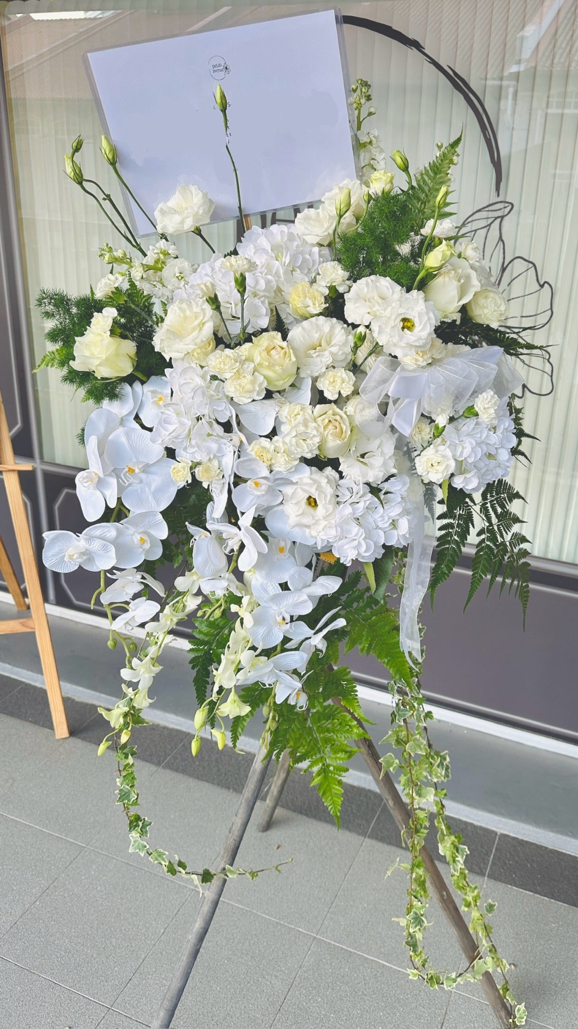 Peaceful Wishes White and Green Flower Wreath