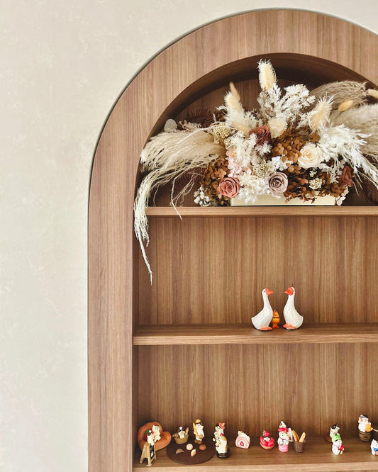 large white, cream, brown and pink custom omakase arrangement.