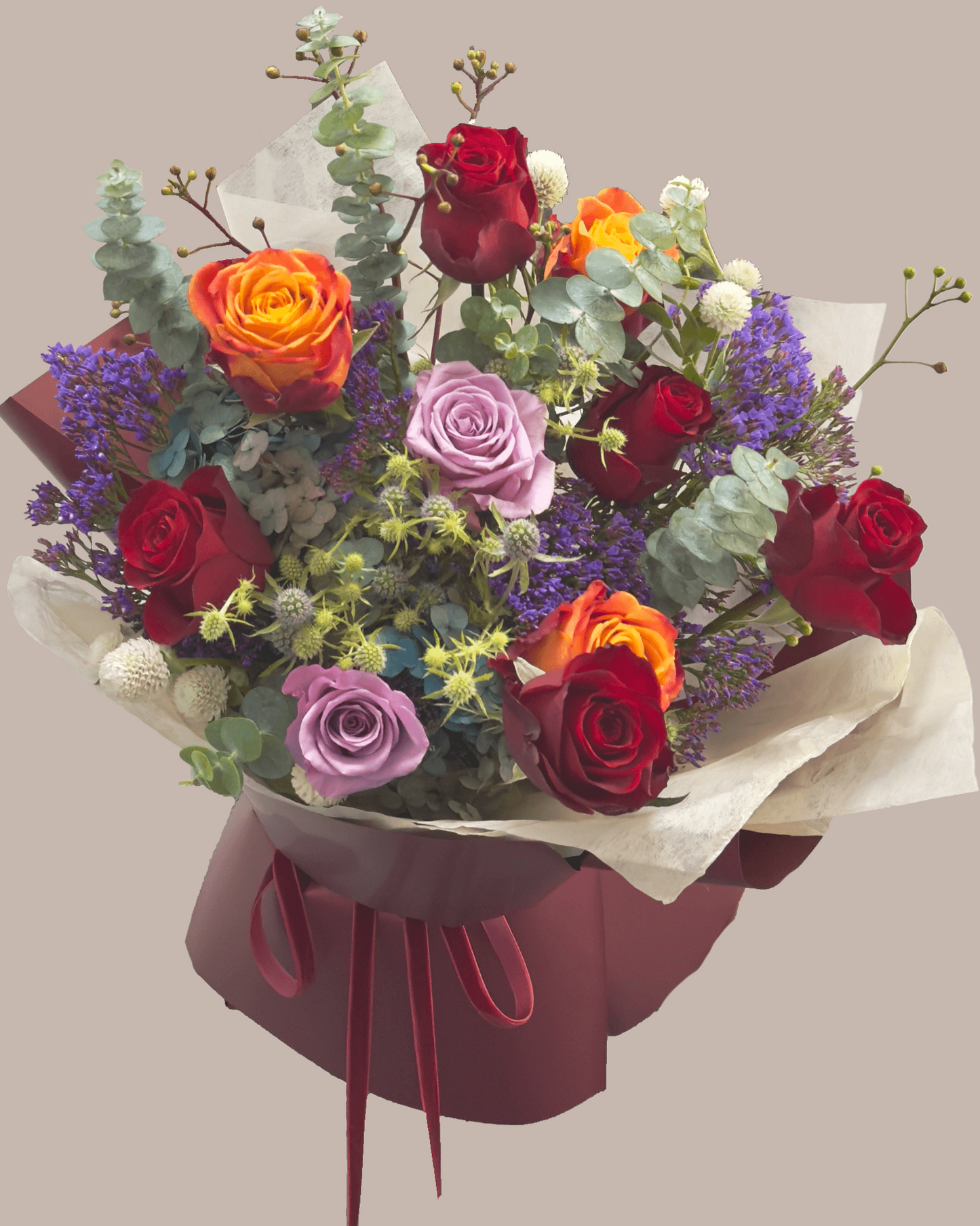 autumnal rose bouiquet and red and orange roses