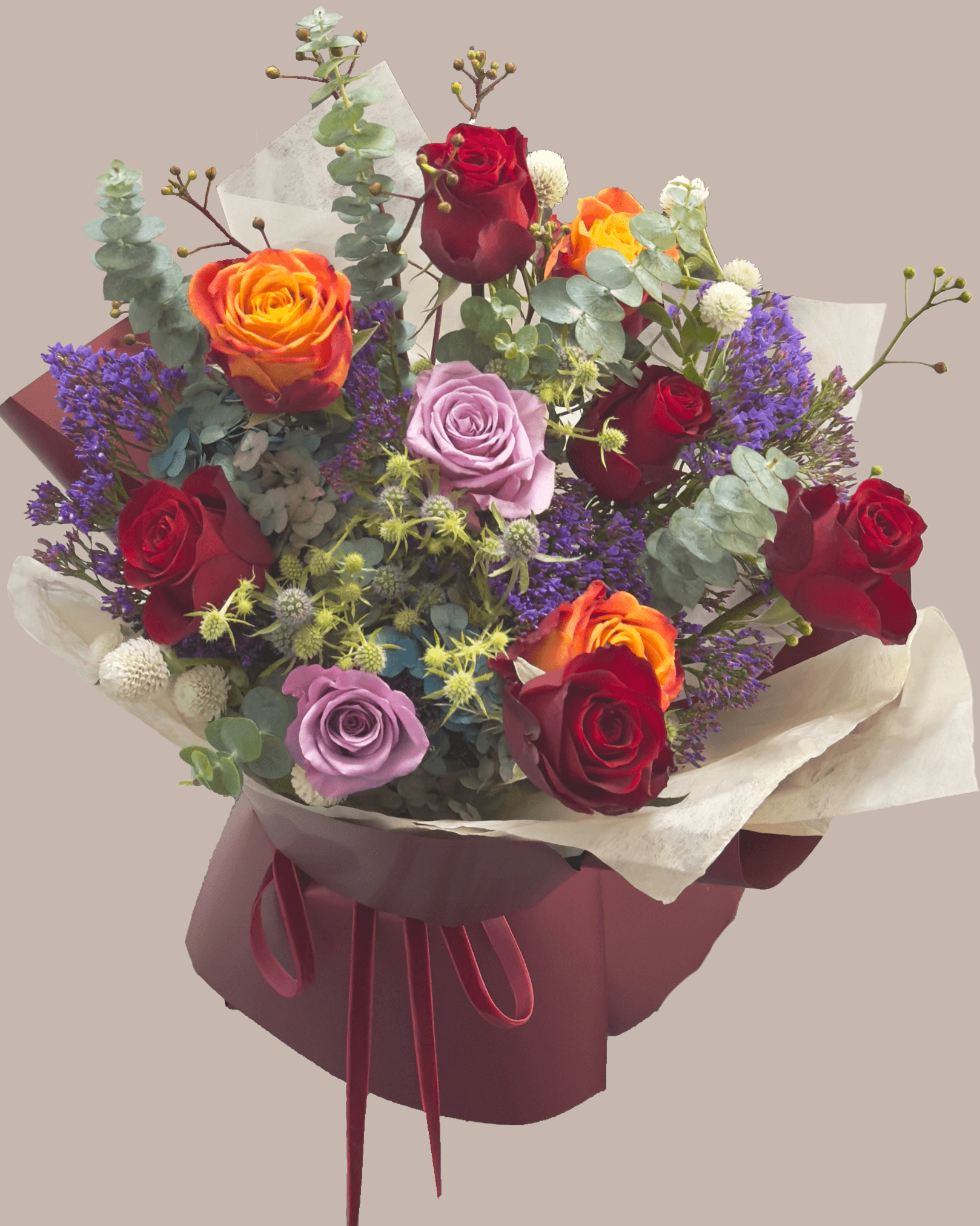autumnal rose bouiquet and red and orange roses